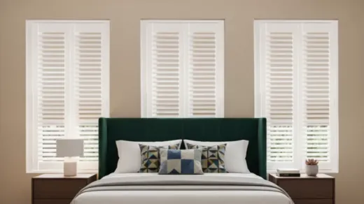 Room with plantation shutters and integrated blackout shade