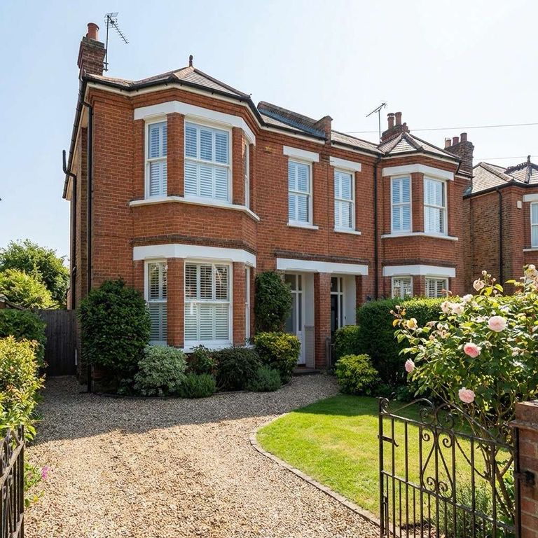 White plantation shutters installed in a traditional West Midlands home
