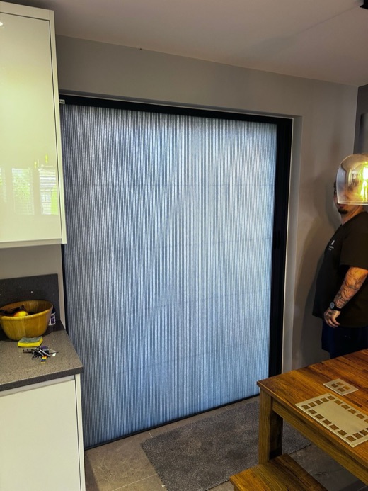 Both French doors fully covered with the grey Scene Set dim-out fabric