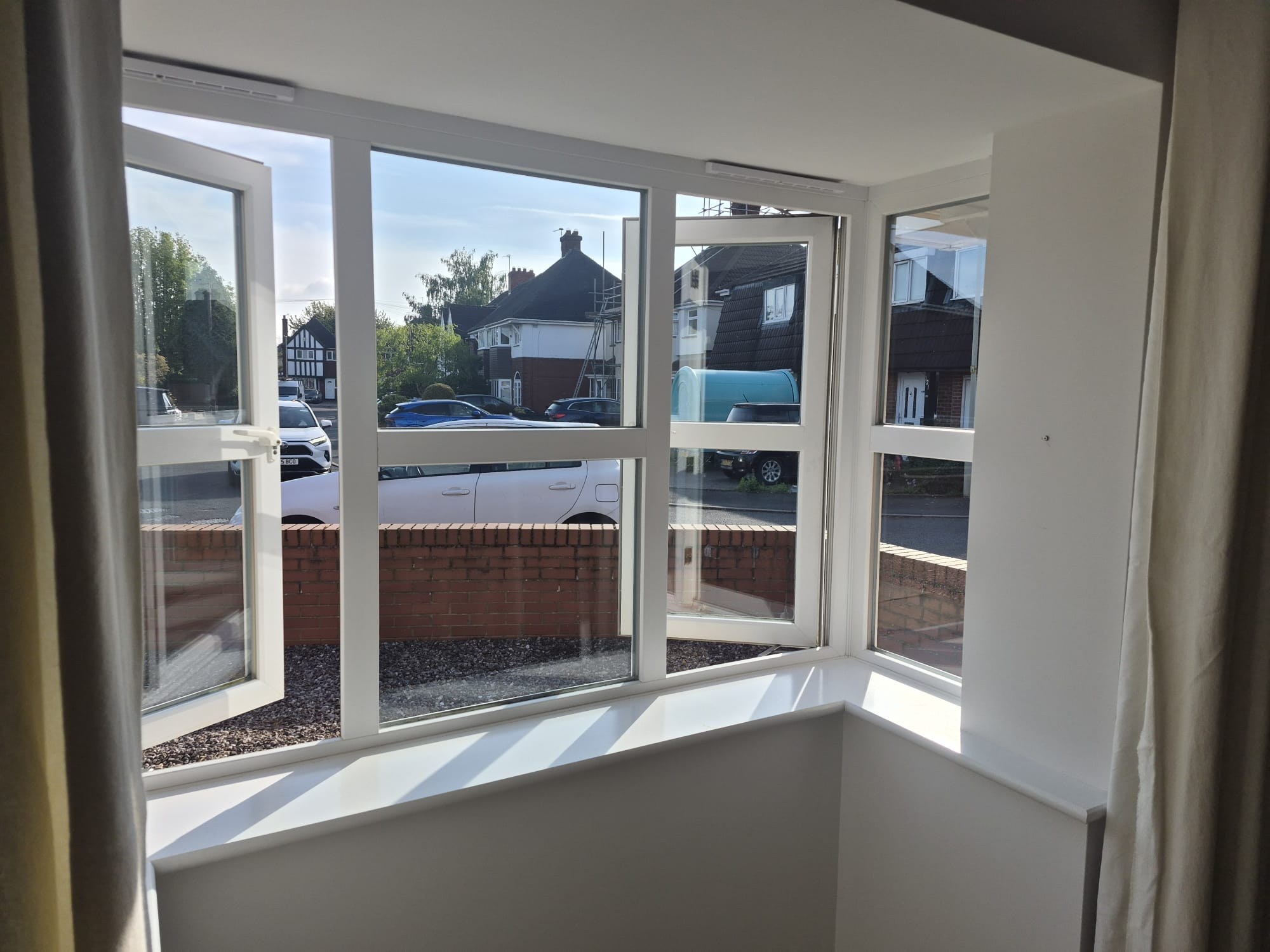 Halesowen box bay window before shutters, viewed from the side showing the angled return panels
