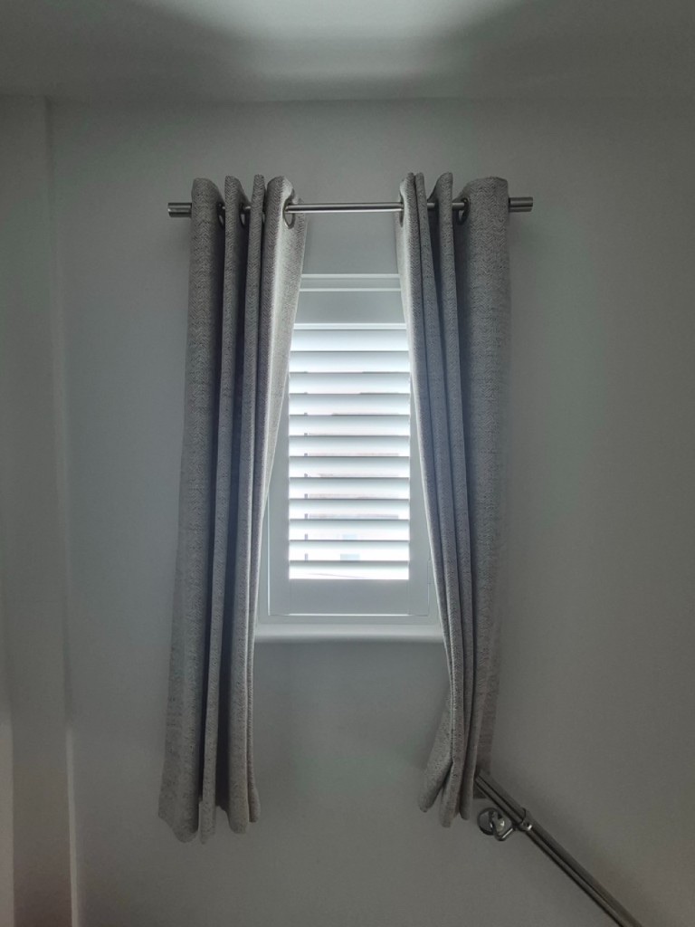 Netherton upstairs hallway Pure White composite shutters with louvres open